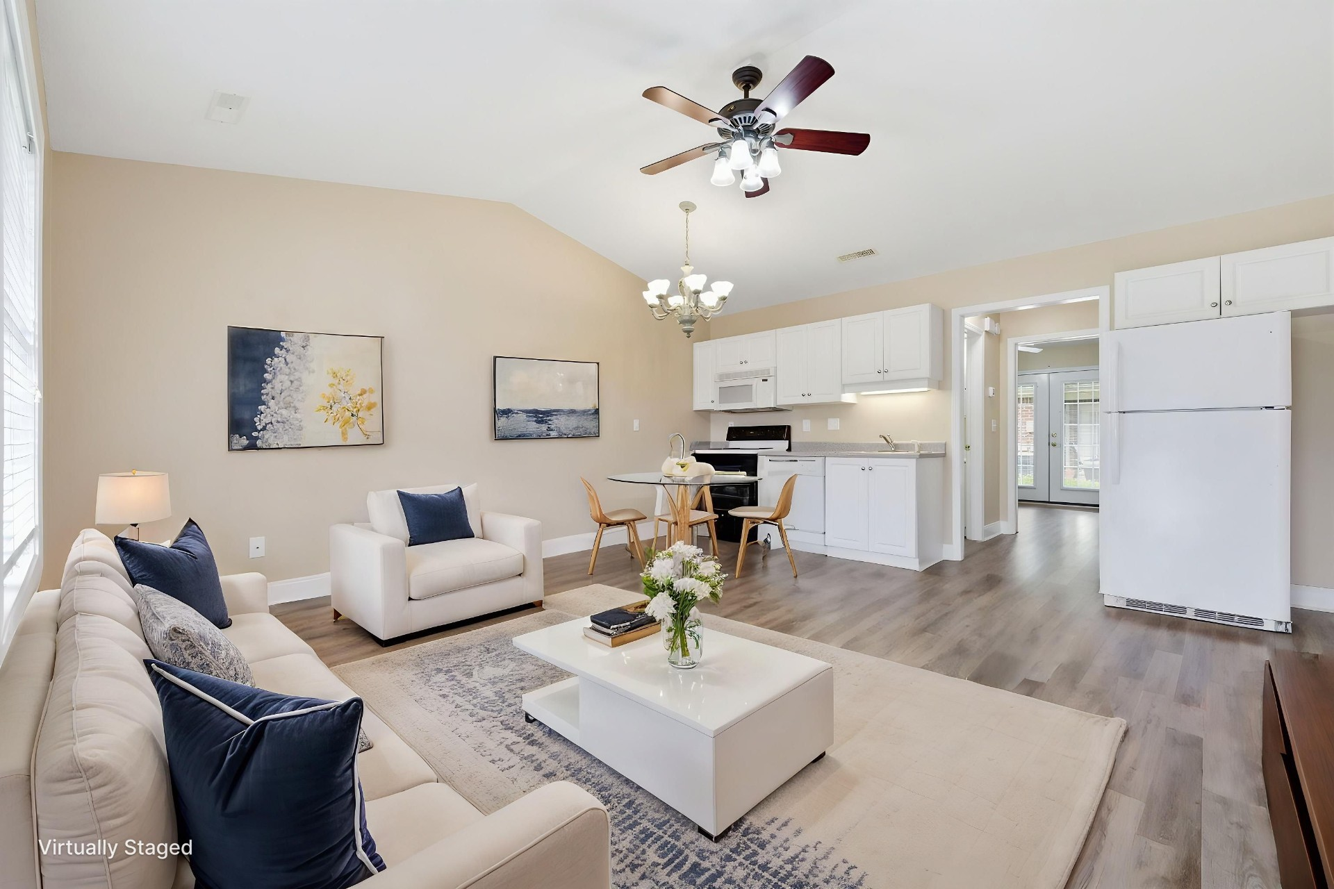 Bright apartment interior with full kitchen and in-unit laundry
